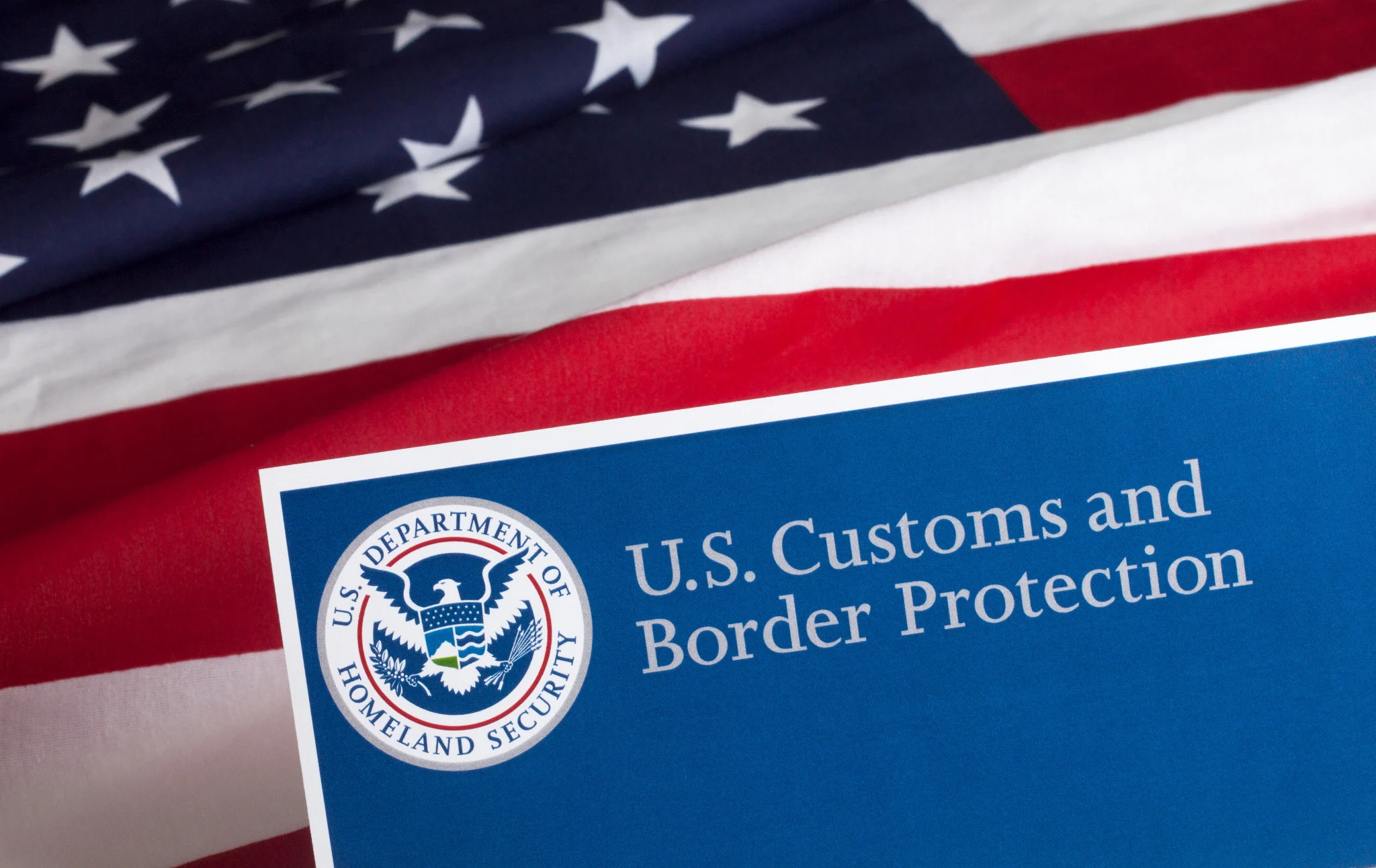 U.S. Customs and Border Protection document displayed with an American flag
