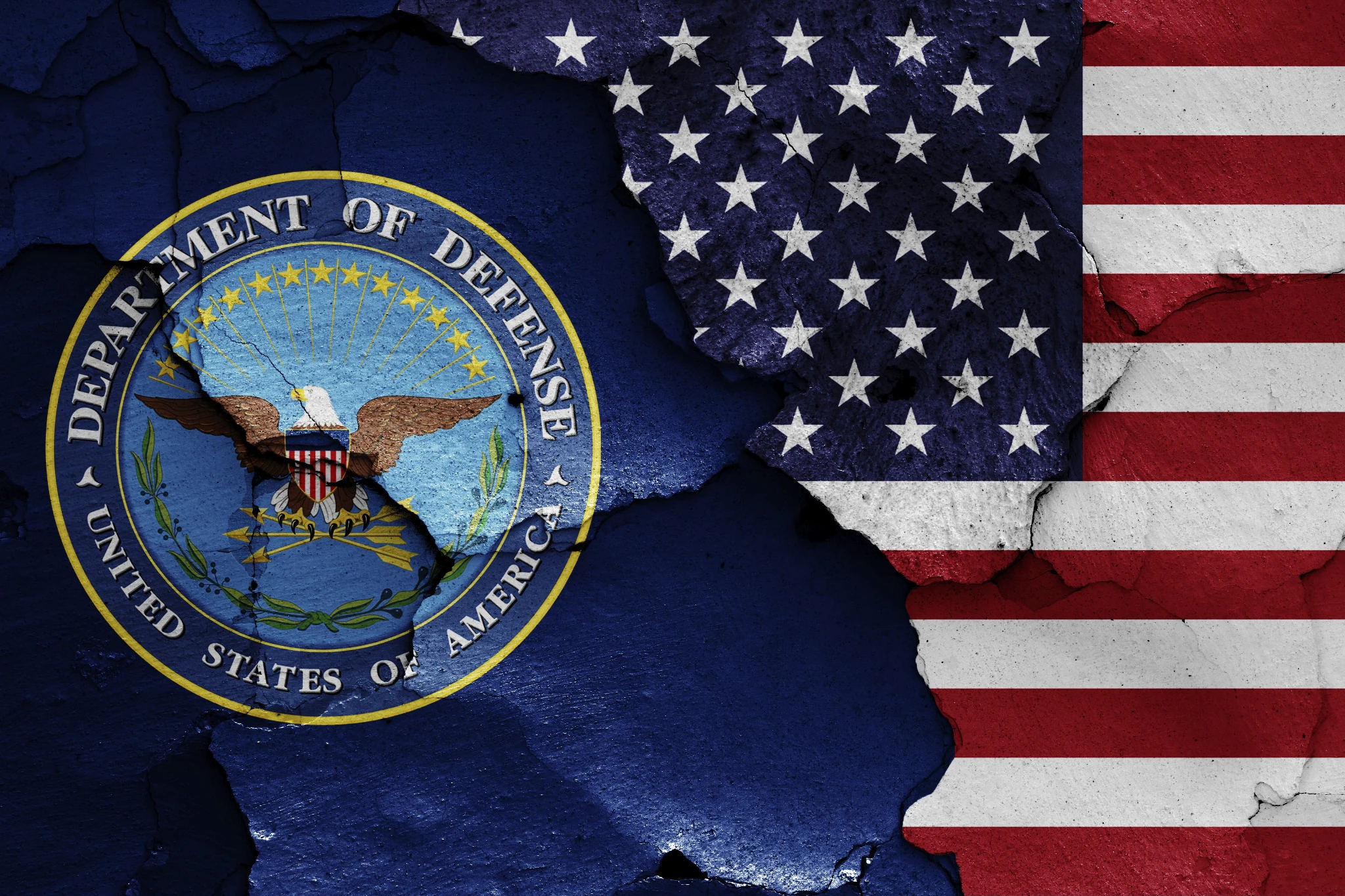 Department of Defense seal layered over a weathered American flag