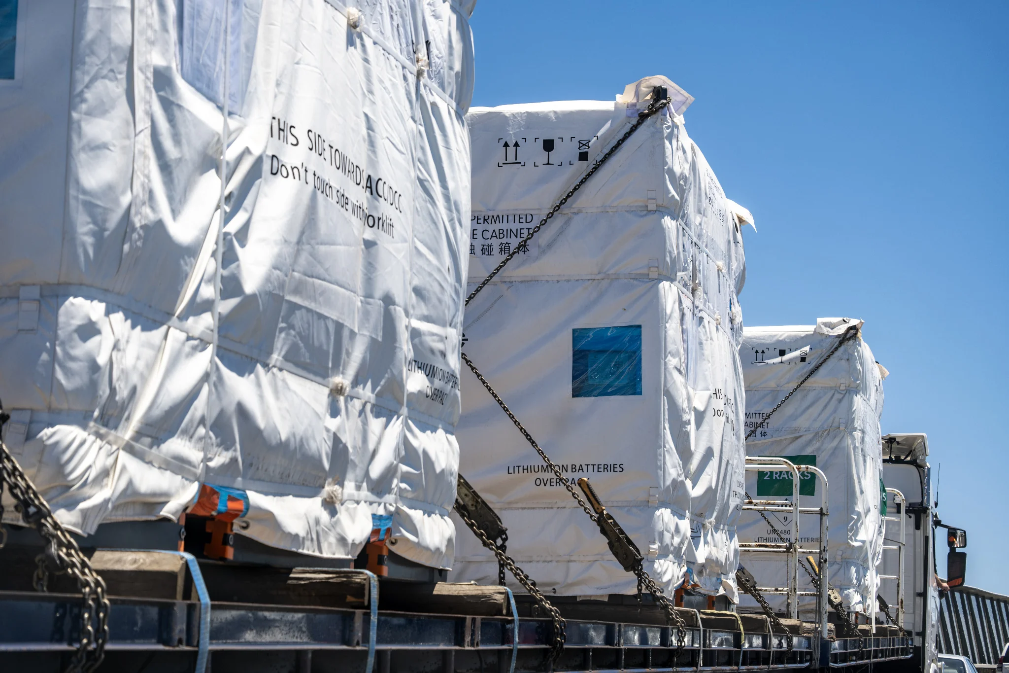 Large lithium battery equipment secured on specialized transport