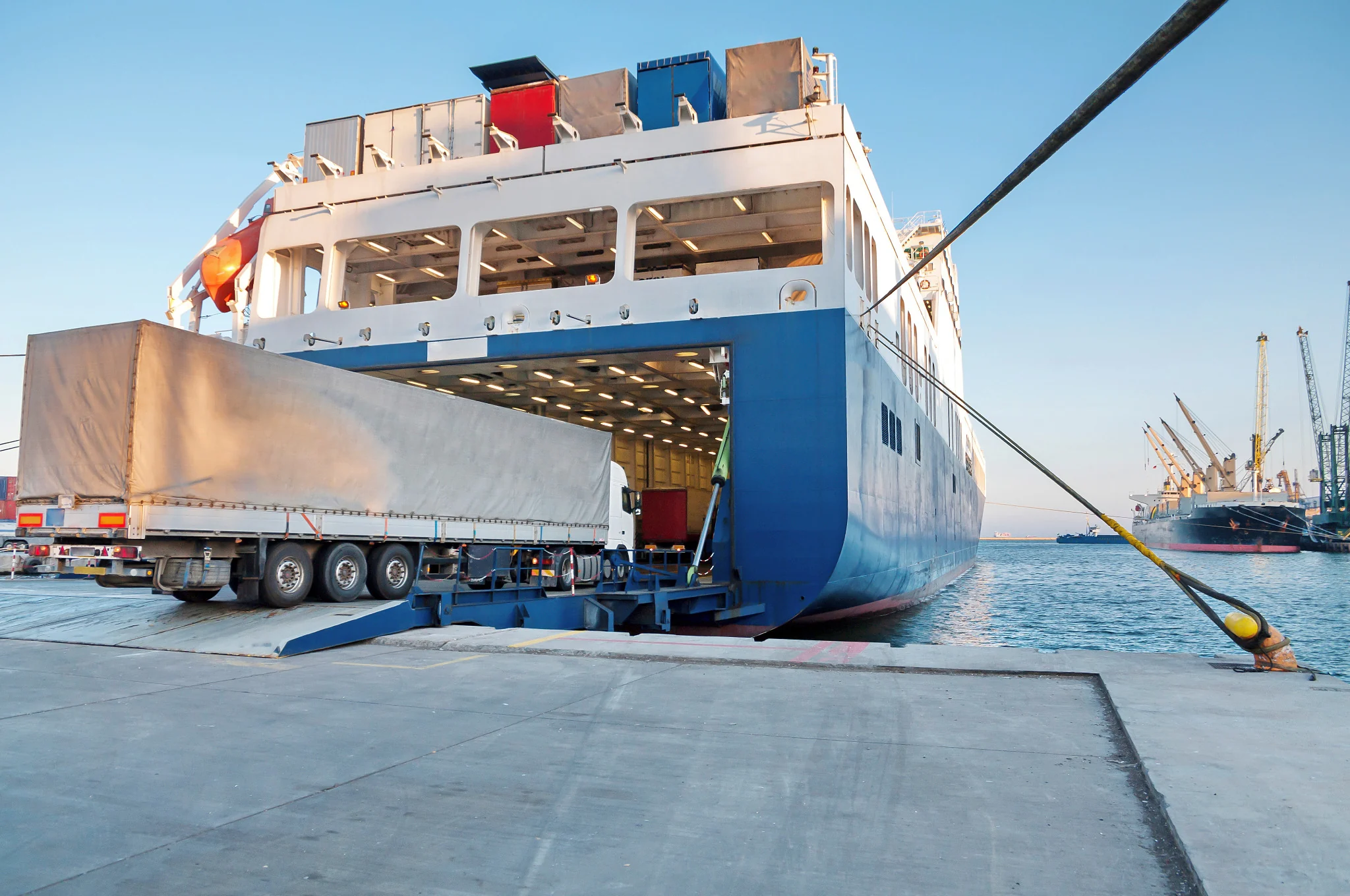 Truck loading onto a roll-on roll-off vessel